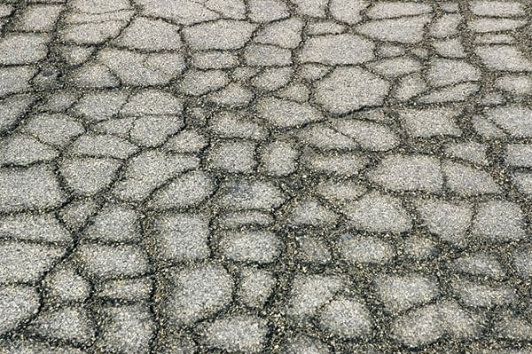 Paved road showing wear and tear related post image