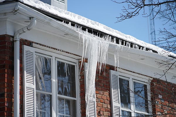 house with icicles hanging related post image