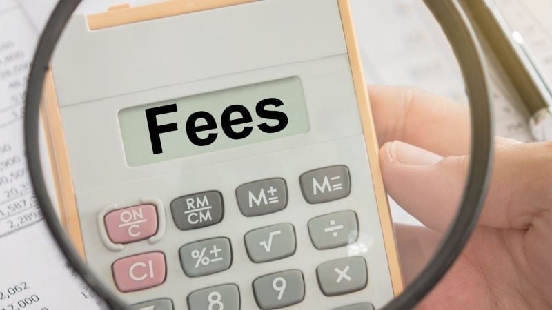 calculator with the word fees on the screen