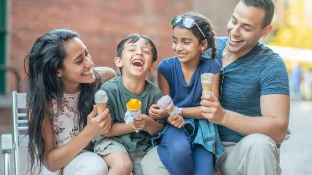 family eating ice cream in HOA community